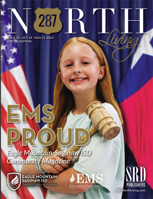 a girl holding a gavel with the us and texas flags behind her